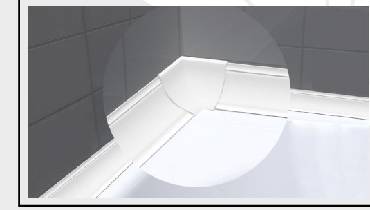 Profilé de finition posé en jonction baignoire/carrelage.