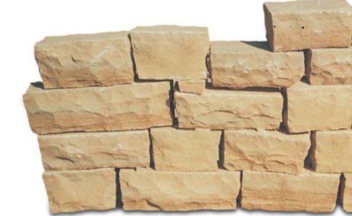 Pierres de mur empilées en grès Ochre Yellow / Banera, taillées à la main.