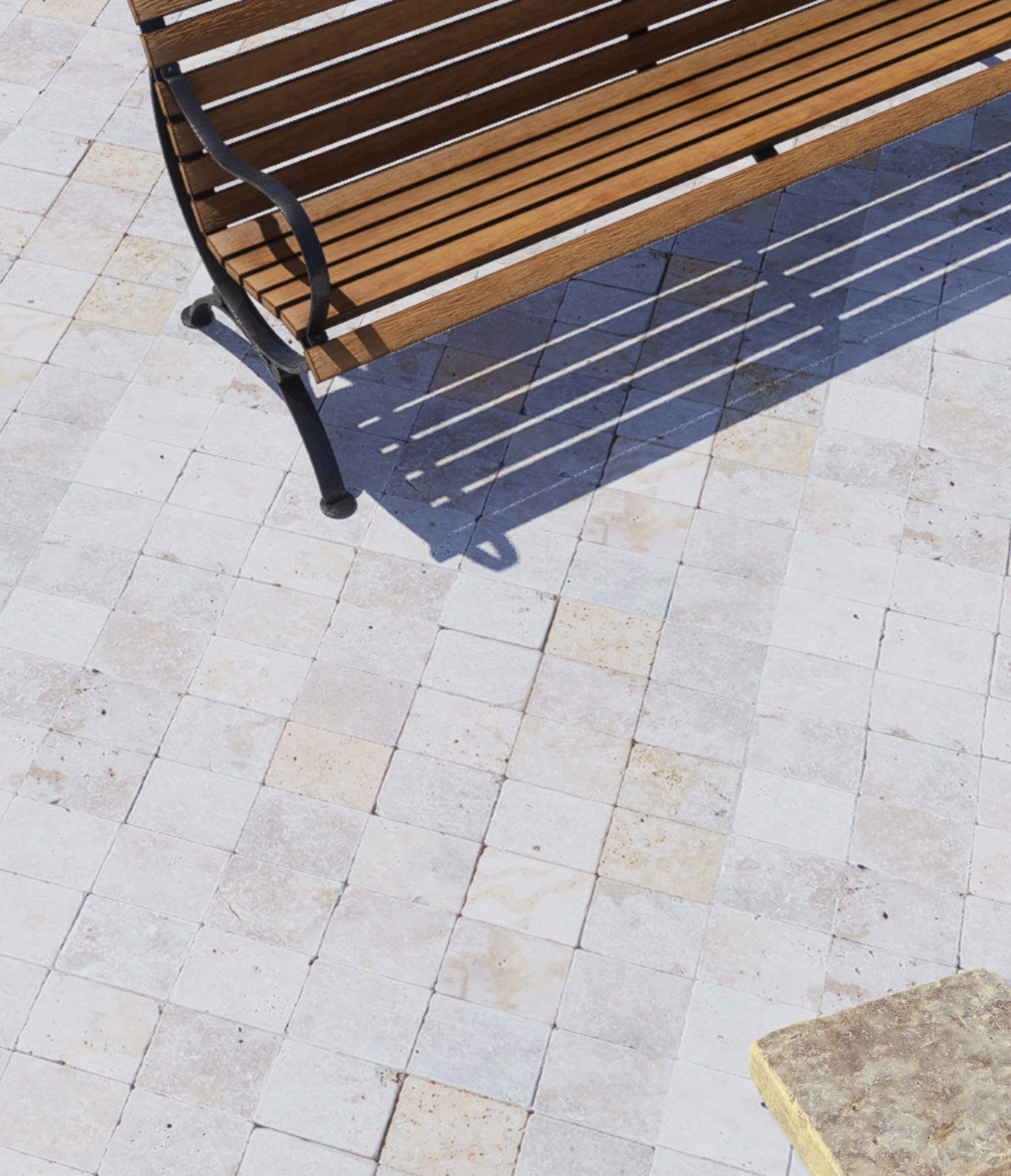 Terrasse extérieure en dallage travertin épaisseur 3 cm, mobilier lounge en mise en scène.